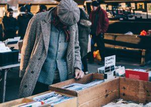 a man shopping on a yard sale