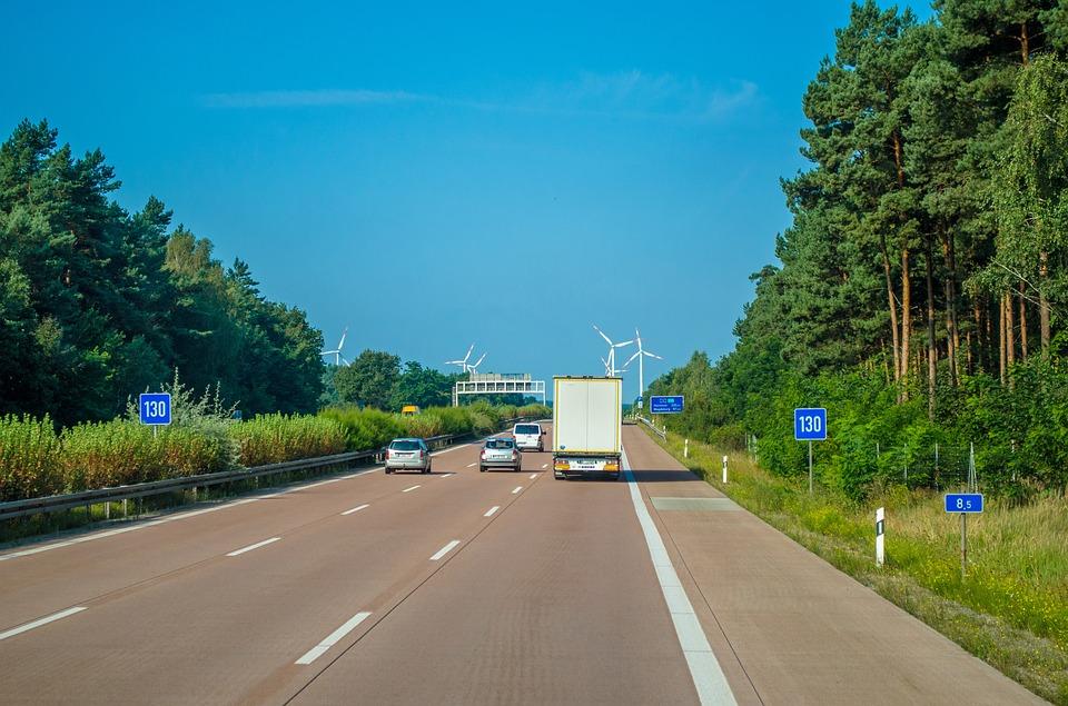Image of a truck on a high-way.