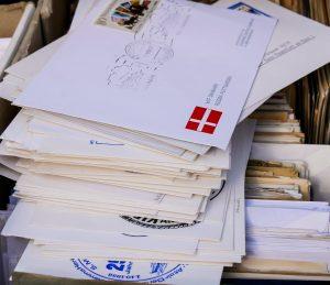 A close up of white envelopes. 