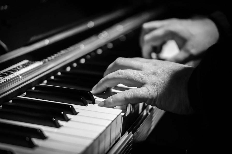 Moving a piano cannot be done with two hands on it.